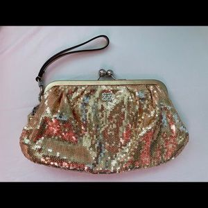 Coach gold sequin with silver wristlet